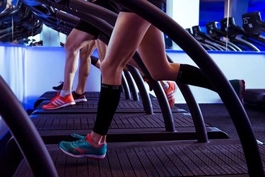 Runners doing treadmill workout class at Mile High Run Club