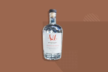 Empower Cosmopolitan Martini bottle on brown background