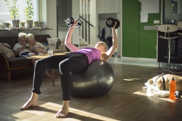 Woman exercising at home
