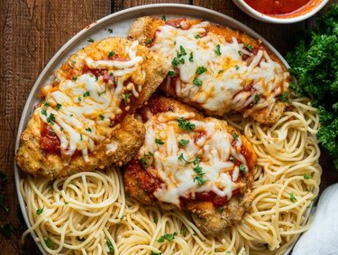 Air Fryer Chicken Parmesan on plate with spaghetti